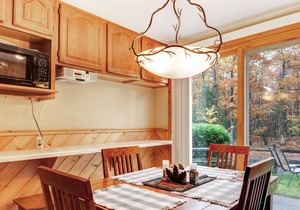 Charming lakefront condo w/ gas fireplace, private deck close on chain of lakes! in Eagle River