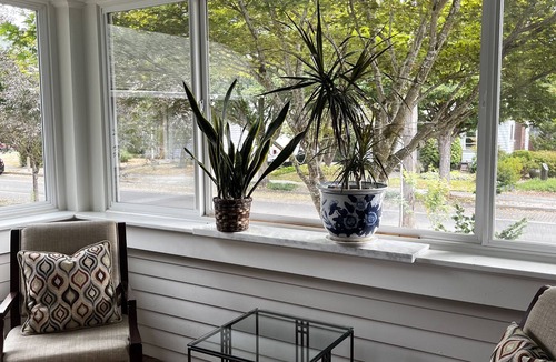 Sellwood-Moreland Apartment | Spacious apartment with enclosed sunporch and garden patio