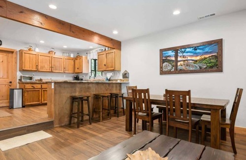 Summit Estates House | Steps to Summit! Indoor Spa. Fireplace. Nice Deck.