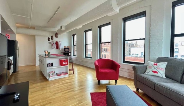 A historic Husker themed, 1,300 square foot loft in the heart of the Old Market in Omaha