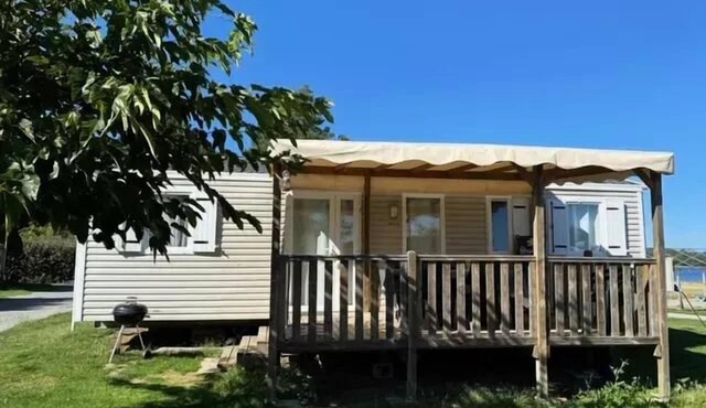 Campsite Flower Le Port de Neuvic * - Comfort mobile home 36m² (3 bedrooms - 6/7 people) 2 bathrooms + covered terrace for 7 people in NEUVIC
