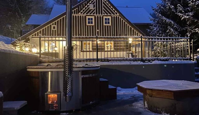 Holiday home Mountain cabin with infra-red sauna and hot tub in Buřany