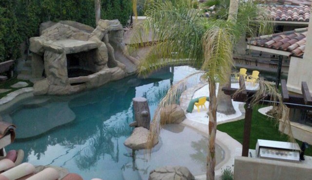 LAZY RIVER! SLIDE and WATERFALLS! GAMEROOM. in Palm Springs