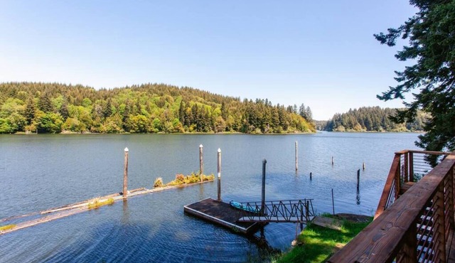Remote 1 BR Lakefront Cabin. Features a King loft bed with lake views, private dock, and provided paddleboards/kayaks. Perfect for fishing, stargazing, and quiet nature escapes. in Lakeside