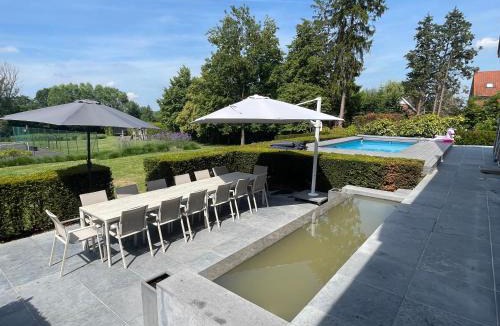 Merelbeke Villa | Exclusive Villa Gentbos - max 28 beds and 6bathrooms, wellness, pool, tennis, fitness, party room