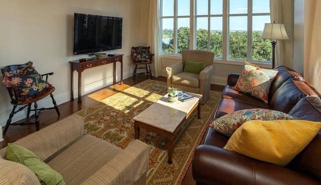 Step into a spacious, luxury condo that has it all – a premiere location in the heart of the Historic District and floor-to-ceiling window views of the Savannah River, Talmadge Bridge and City Hall. 5th floor.Best river views in the building. in Savannah